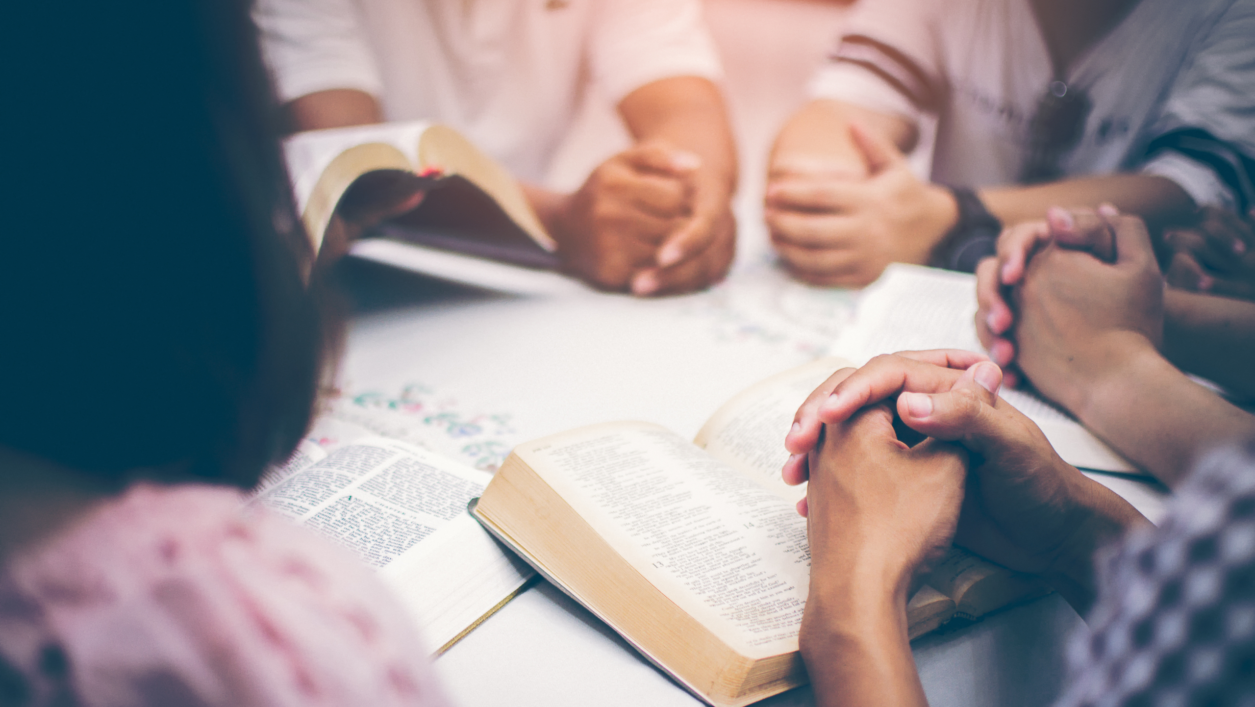 Christians are congregants join hands to pray and seek the bless